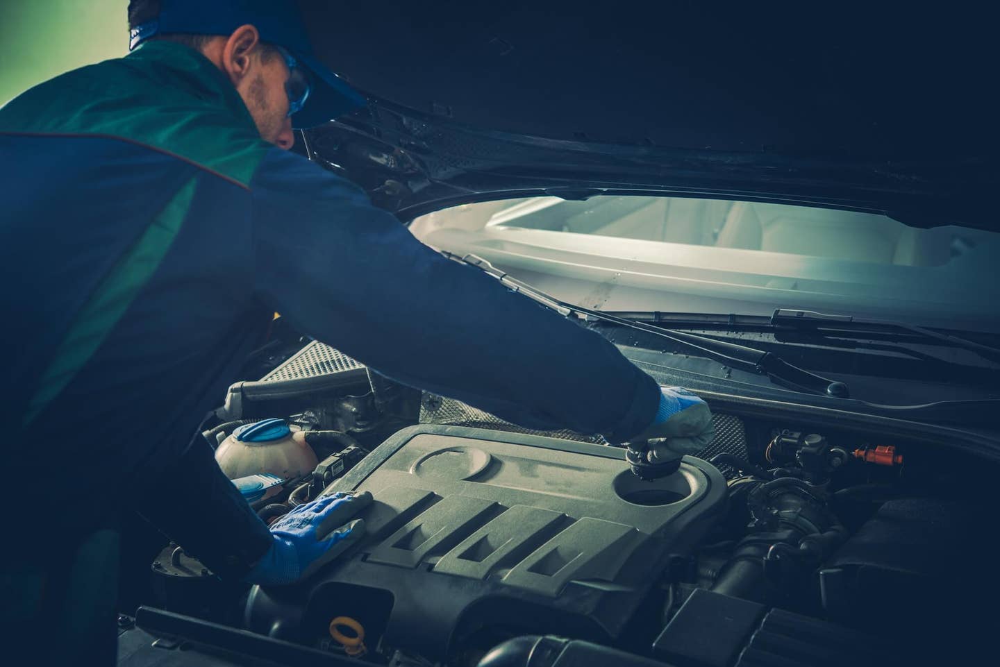 Vehicle Fluids Maintenance by Professional Car Mechanic