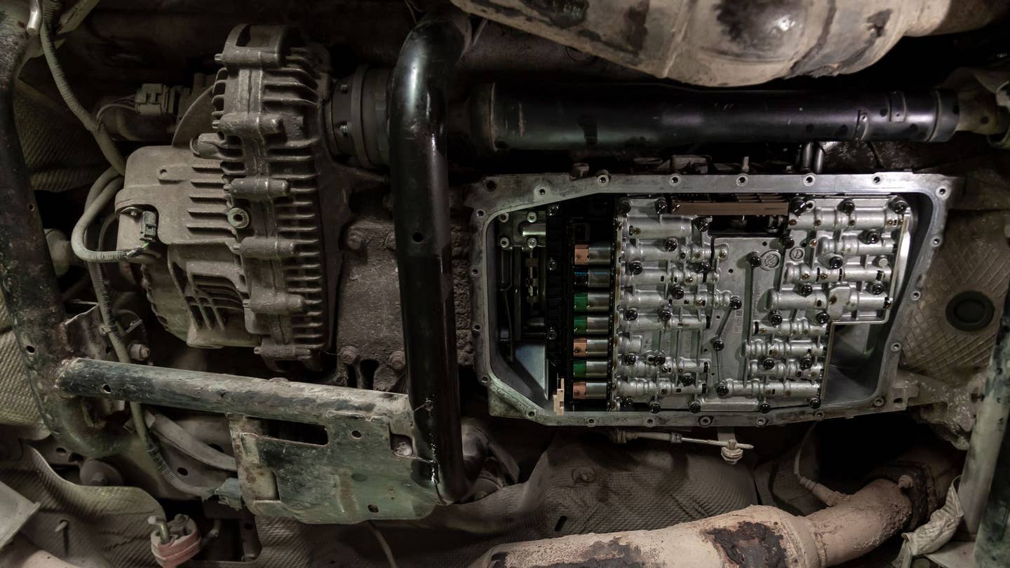 Inside the transmission fluid pan. 