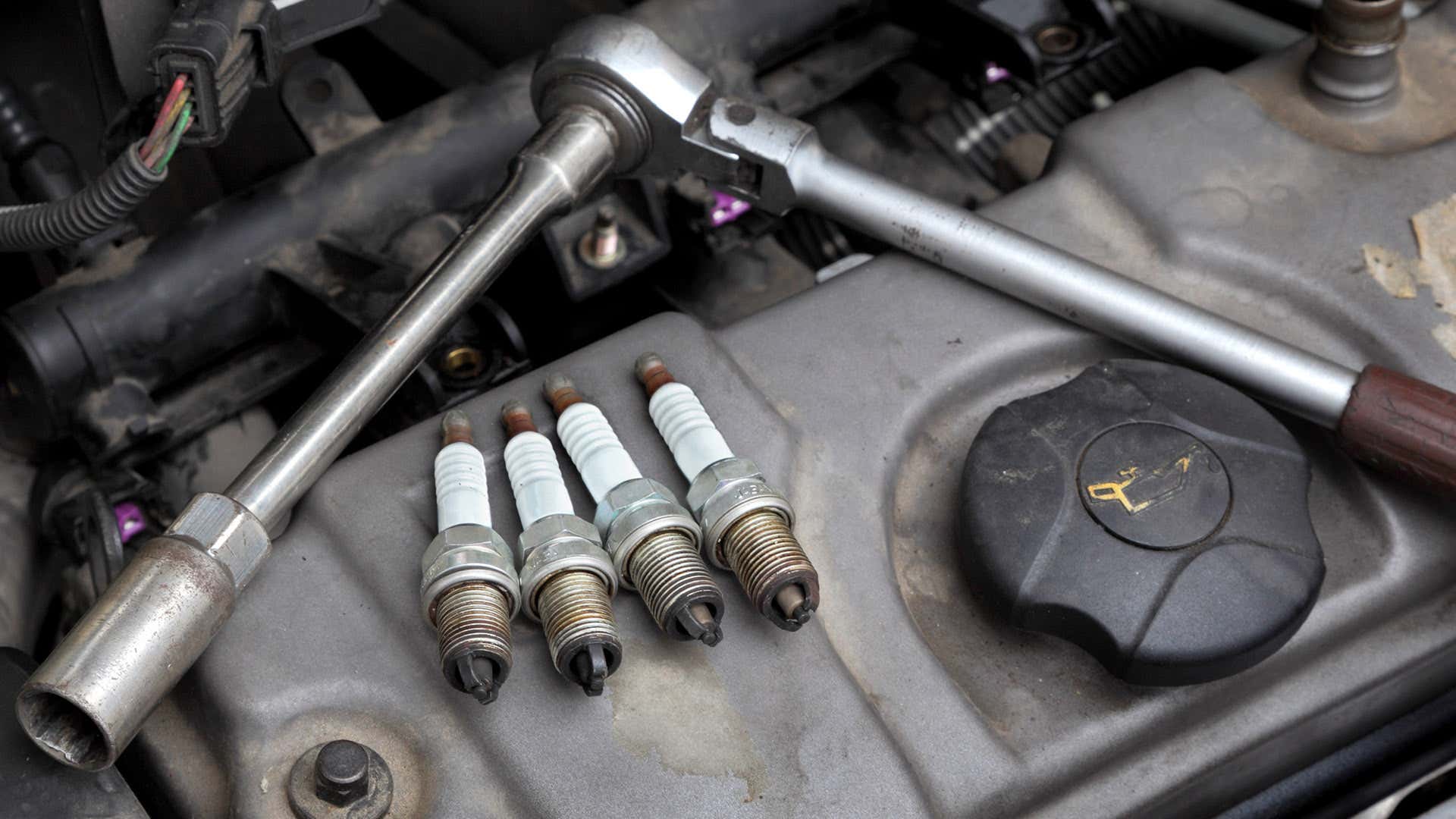 Spark plug removal requires a specific socket.