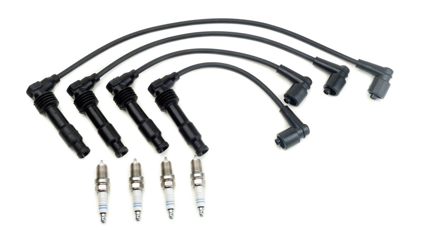 Spark plug wires connect the distributor to the spark plugs.