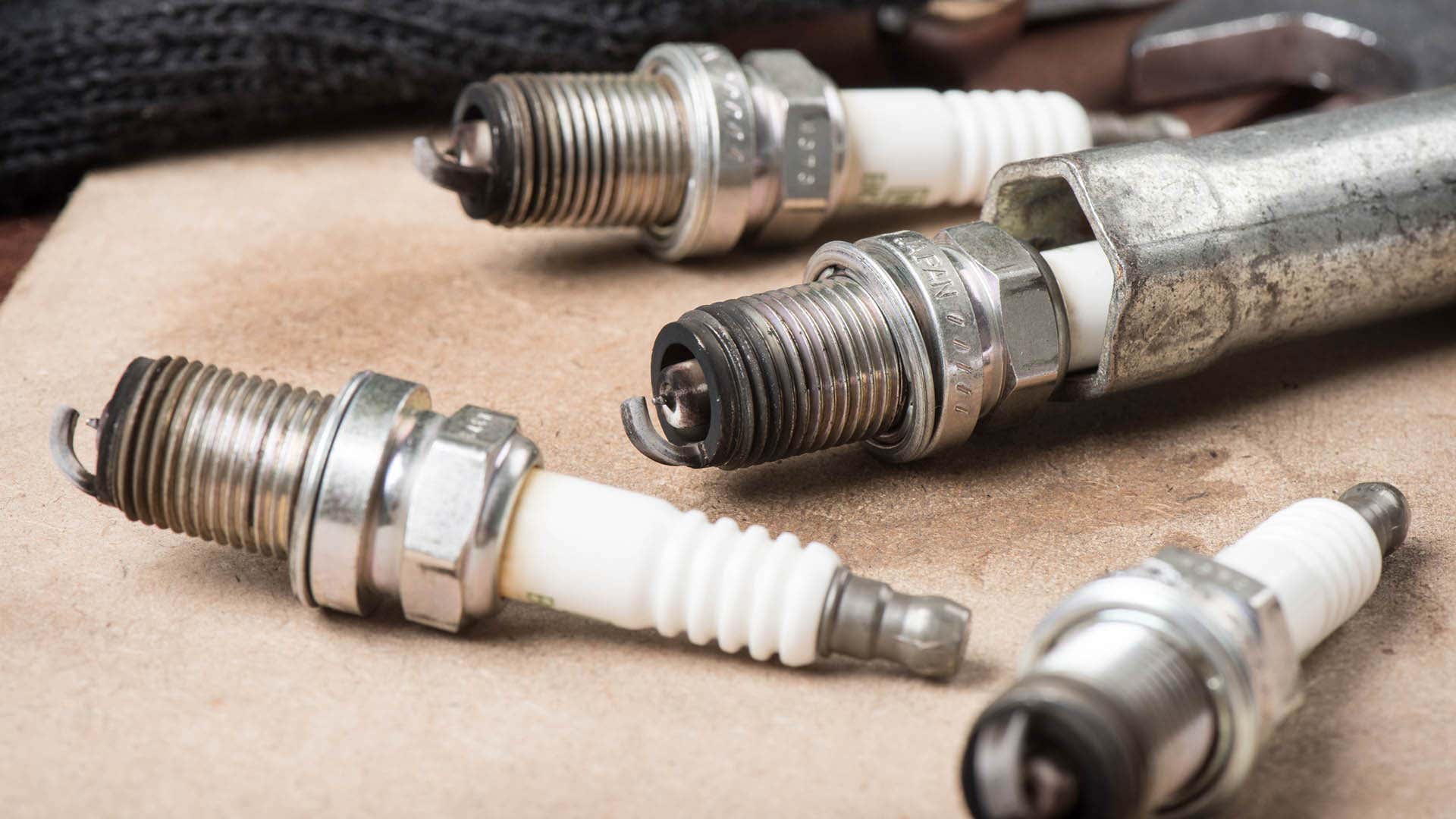 Used or bad spark plugs will often show dark wear near the tips.