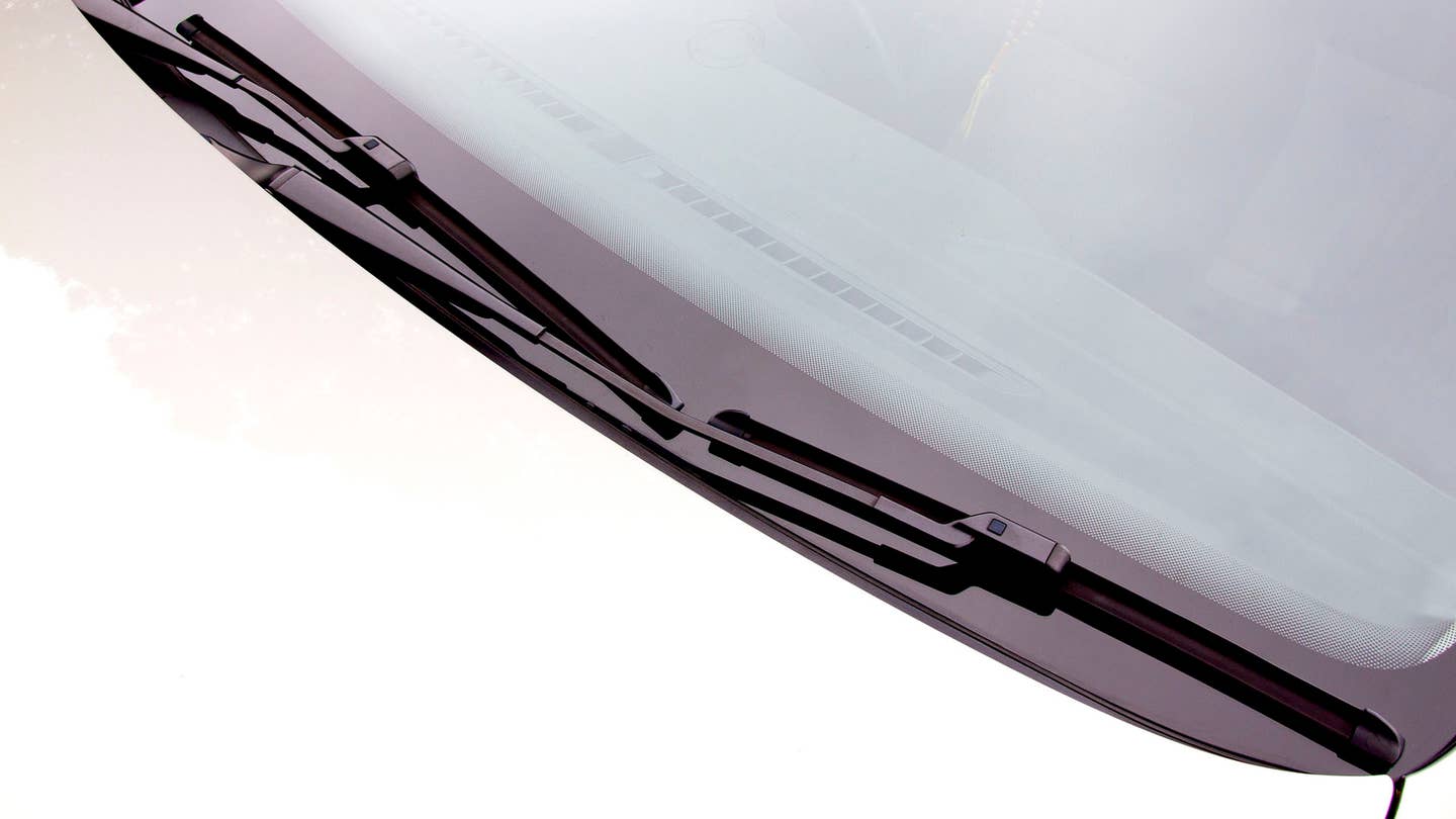 Flat wiper blades use a center connecting piece.