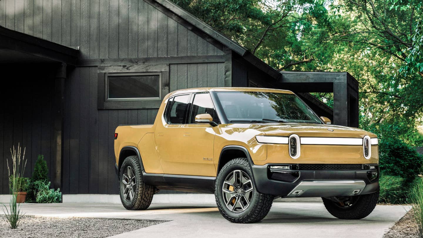 Rivian's R1T showing off in a gorgeous sand color.