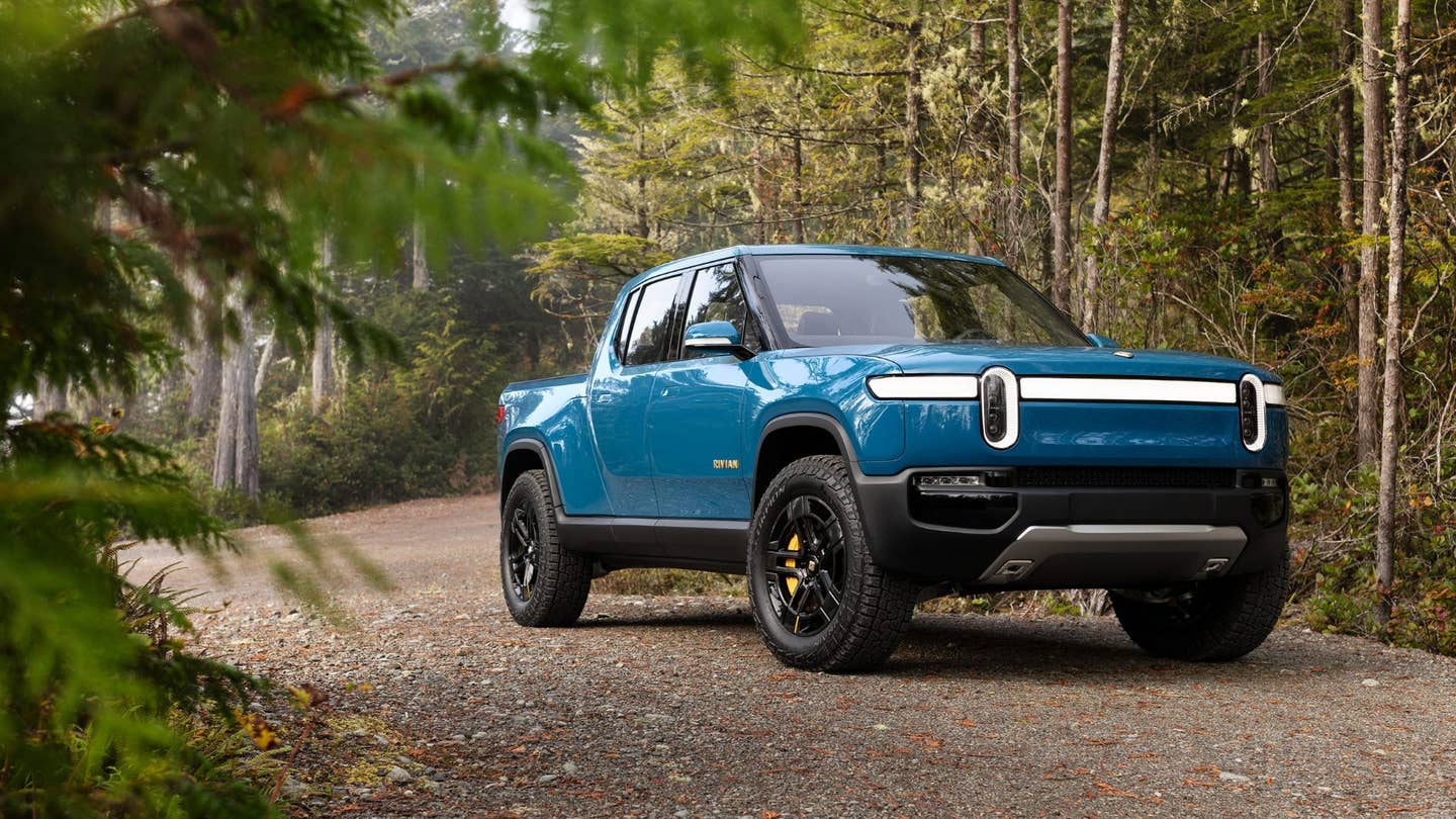 Rivian looking good among the forest in blue.