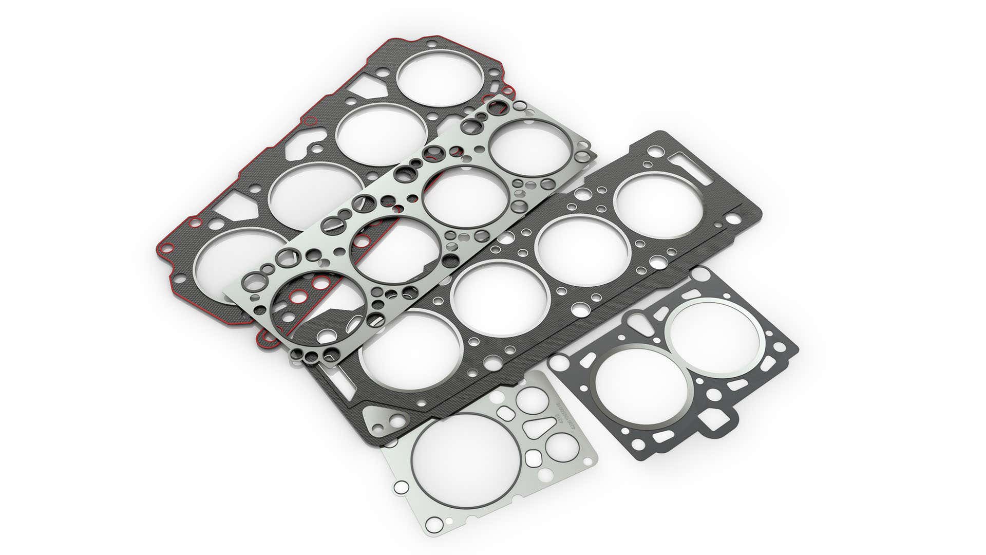 Various gaskets on a white background.