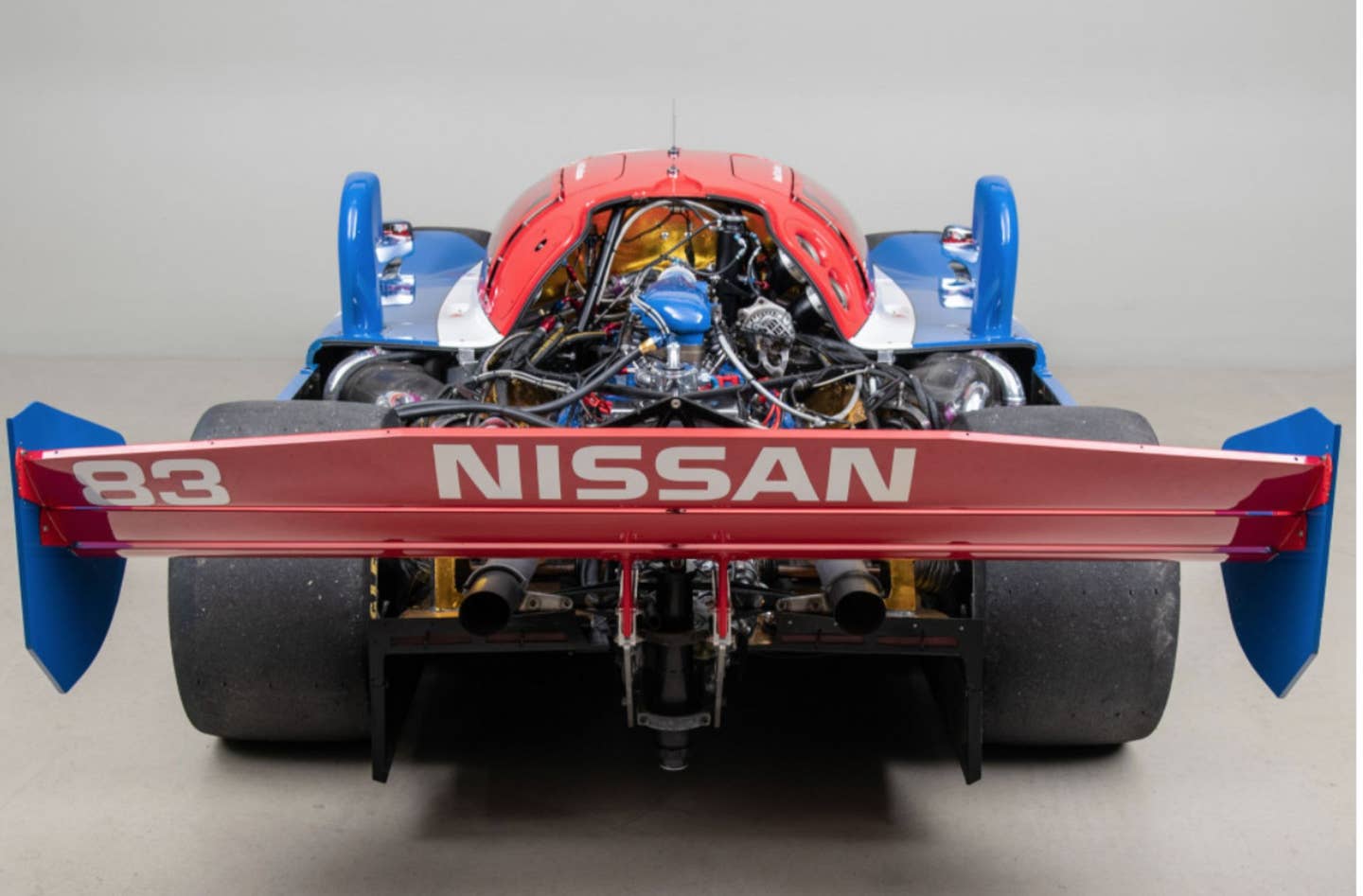 message-editor%2F1602037263814-nissan-1990-npt-90-rear-view-with-engine-visible.jpg