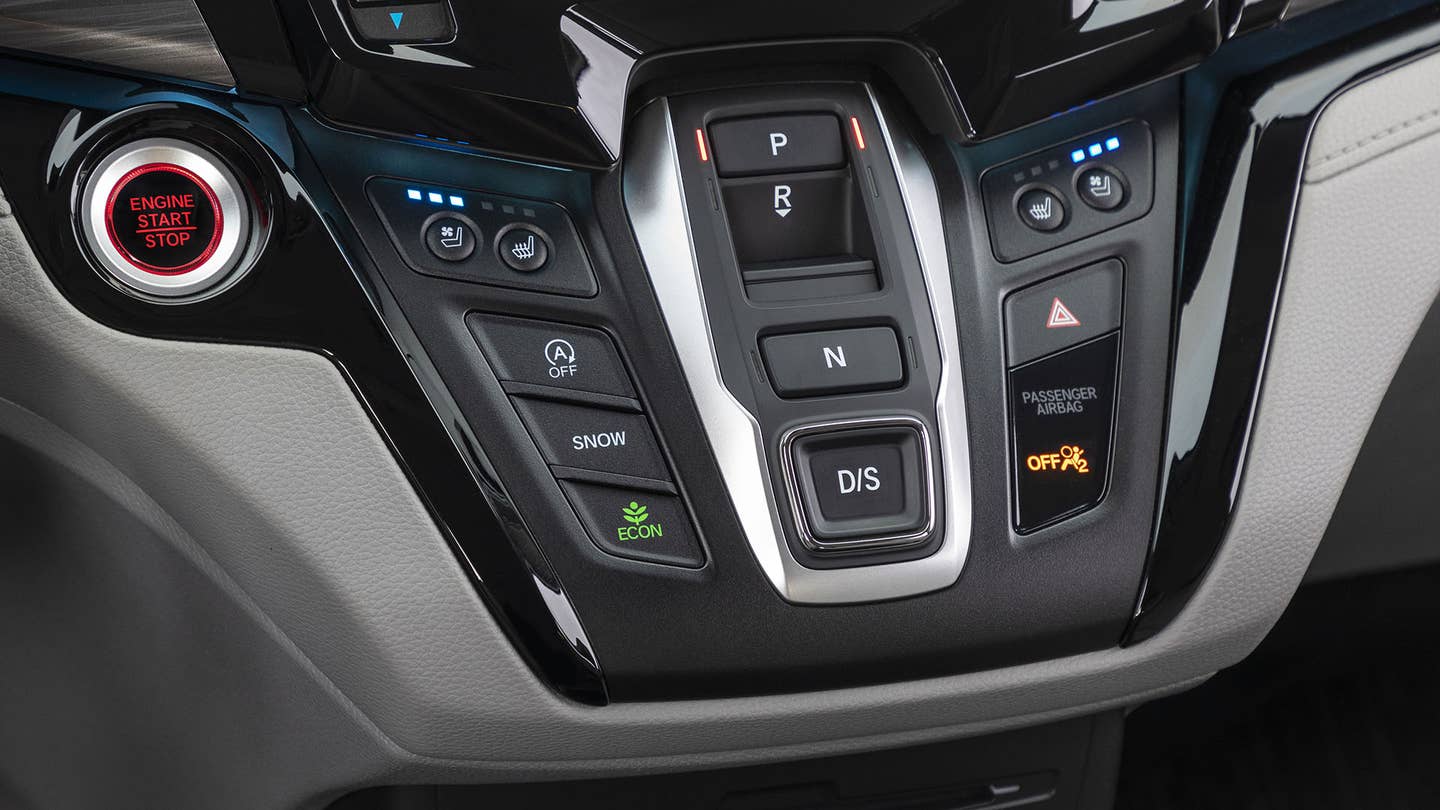 The Honda Odyssey gear selector uses buttons for P,R,N,D/S.