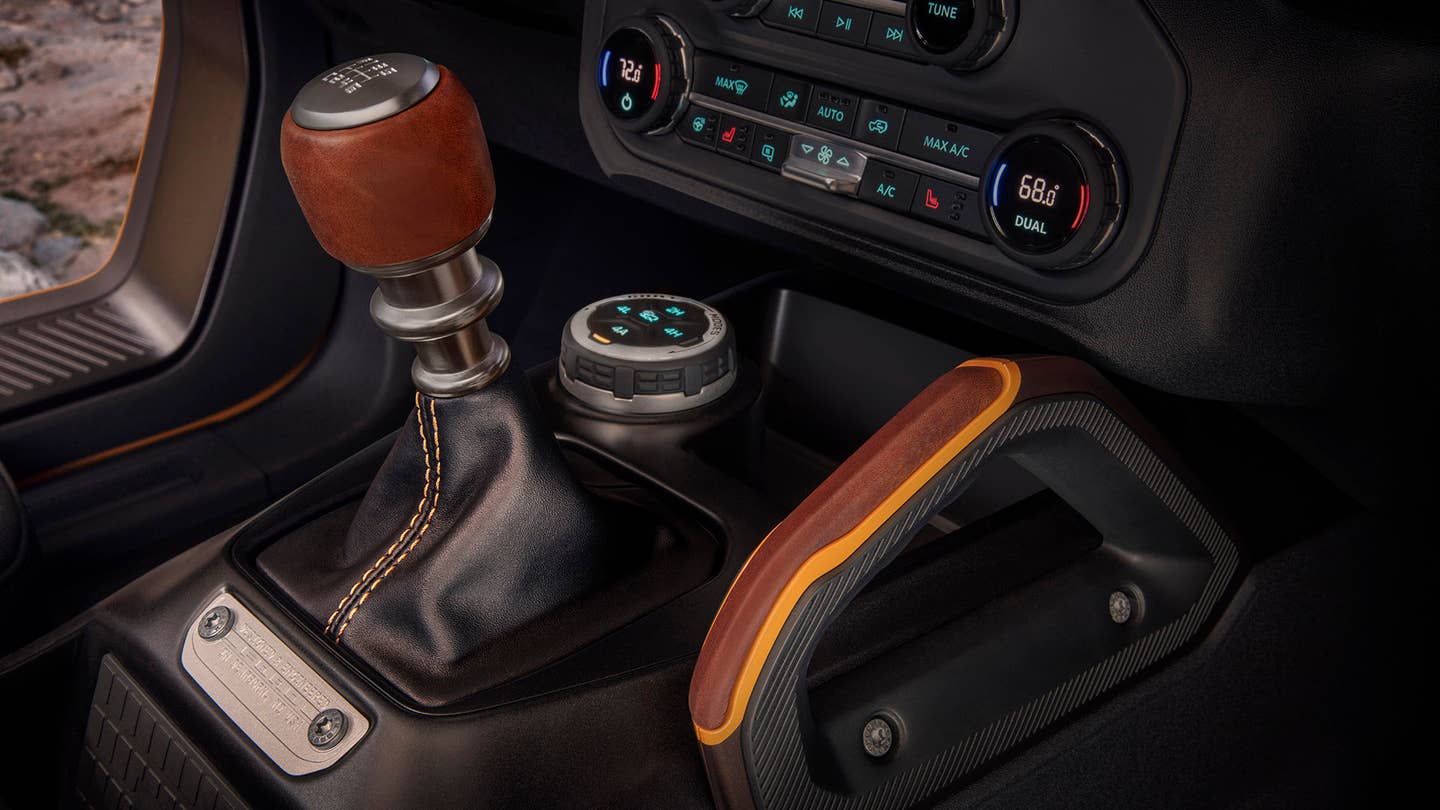 The Ford Bronco's center stack, including the manual shifter.