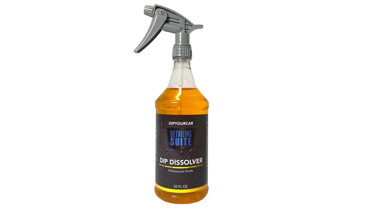 A bottle of Dip Dissolver against a white background.