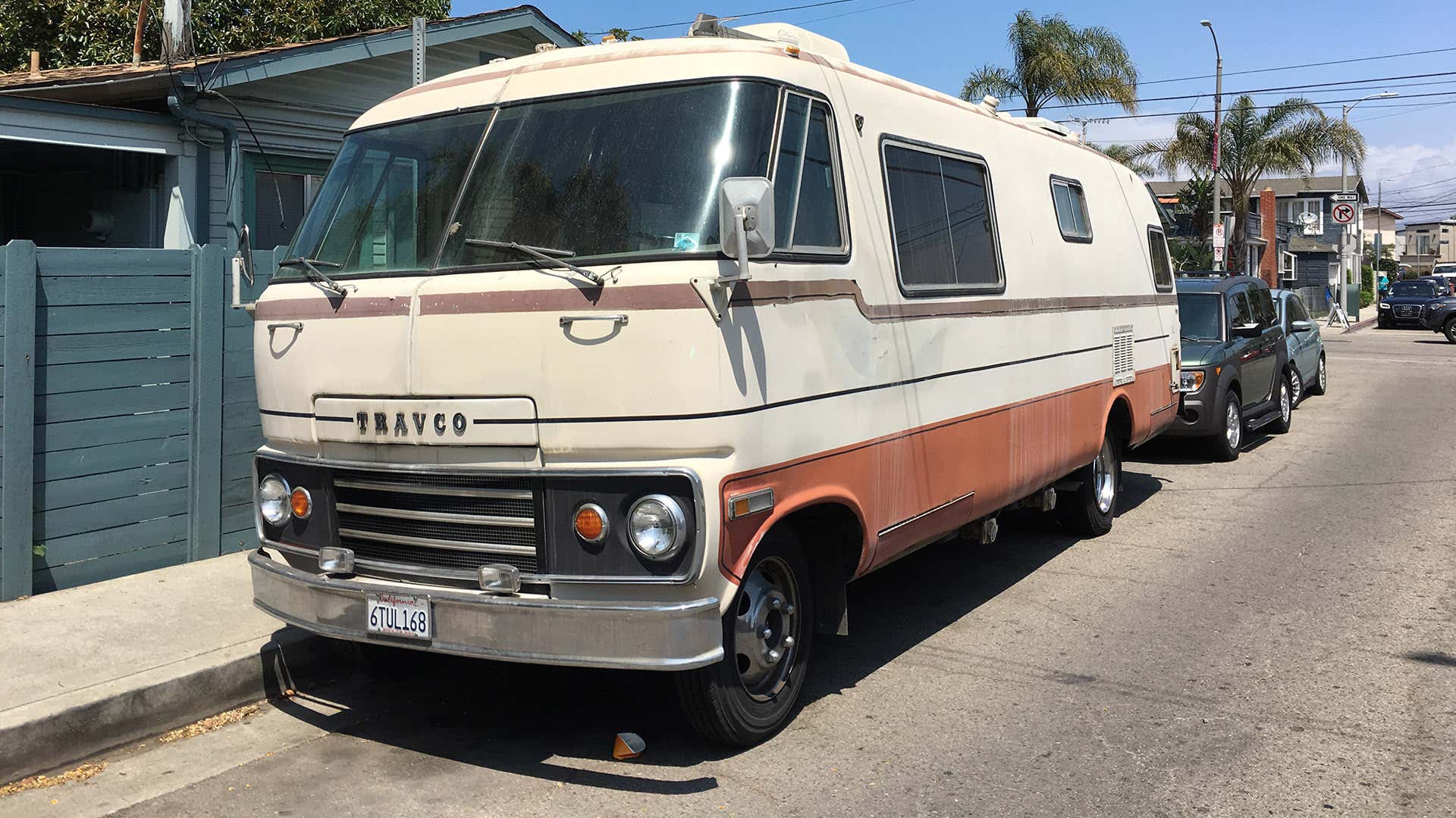 A Travco RV parked on the street.