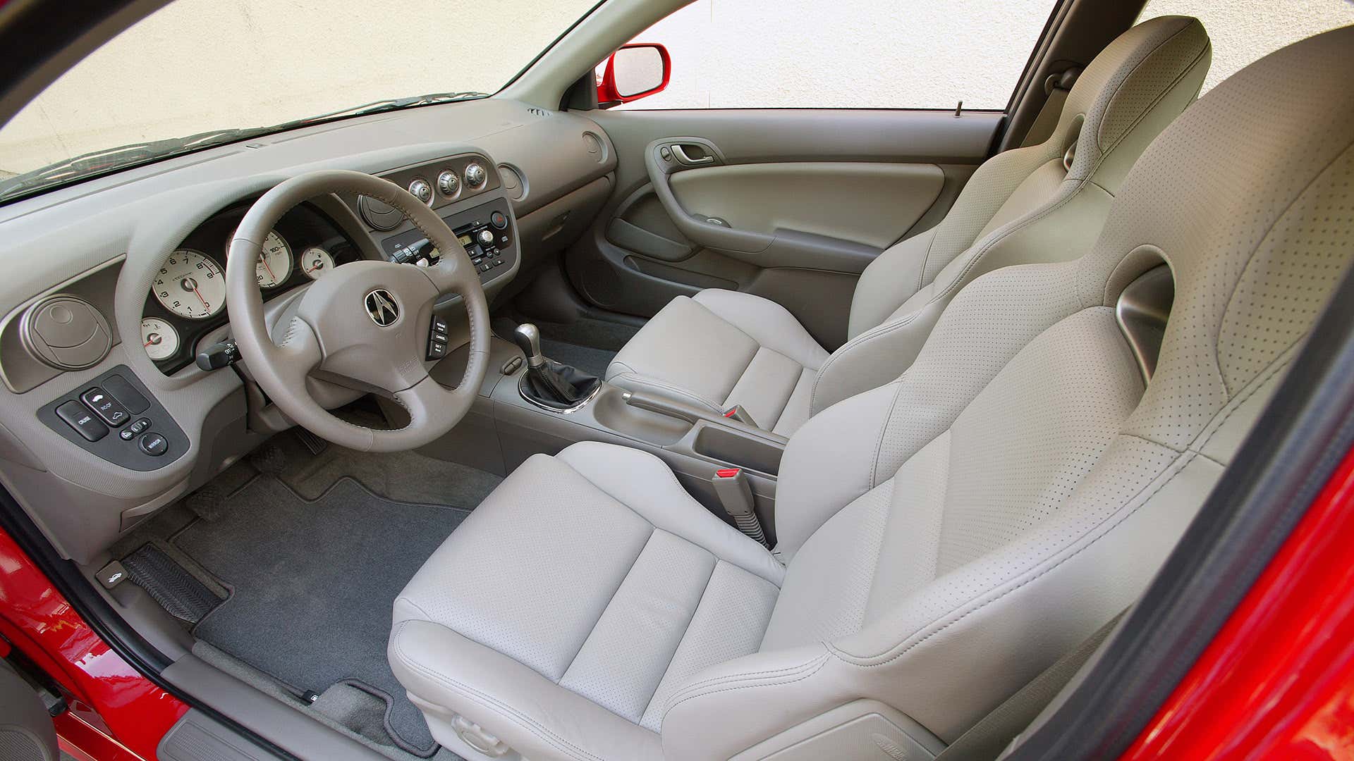 A 2006 Acura RSX interior with tan leather.