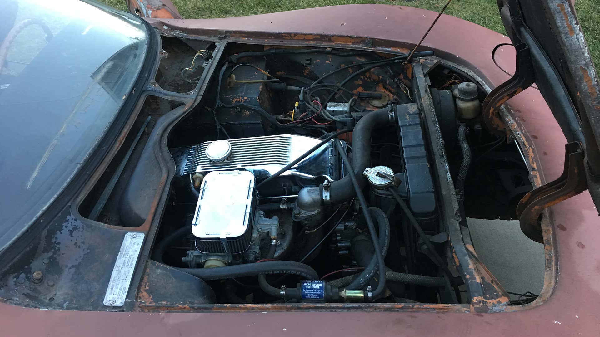 The engine bay of a 1970 Opel GT.