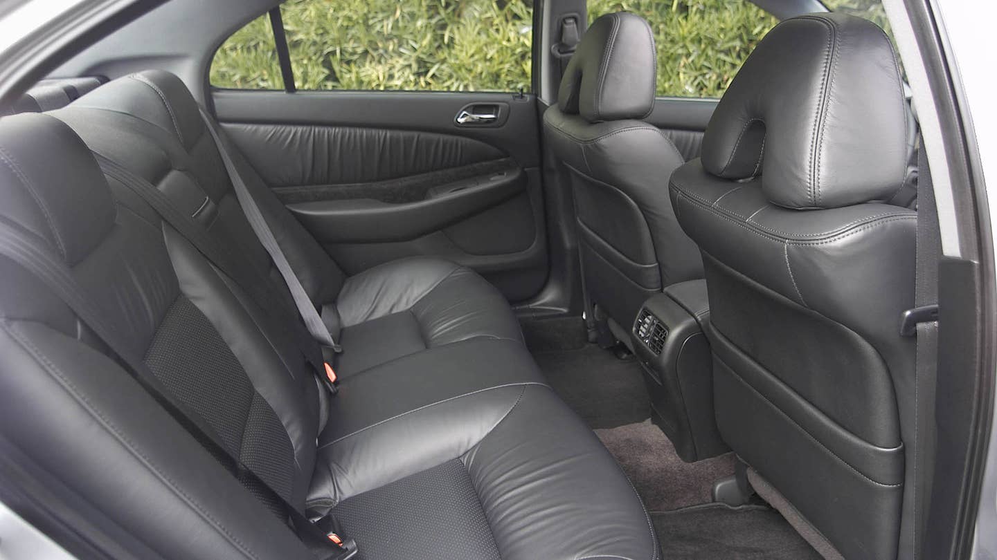 The black leather back seats of the 2002-2003 3.2 TL Type S.
