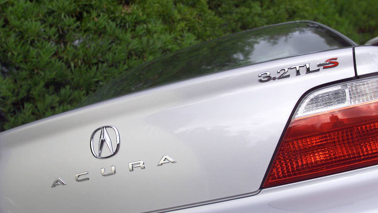 The rear badging on a 2002-2003 3.2 TL Type S.