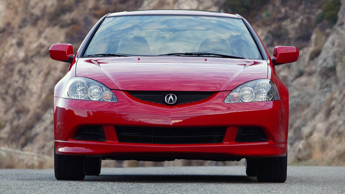 The front view of the 2005-2006 Acura RSX Type S in red.