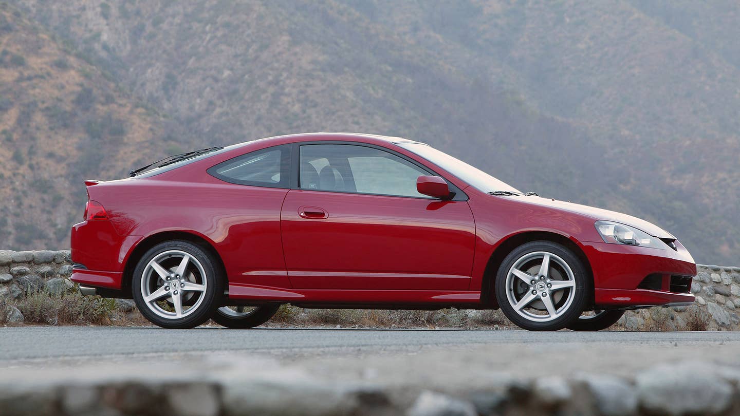 The side view of the 2005-2006 Acura RSX Type S in red.