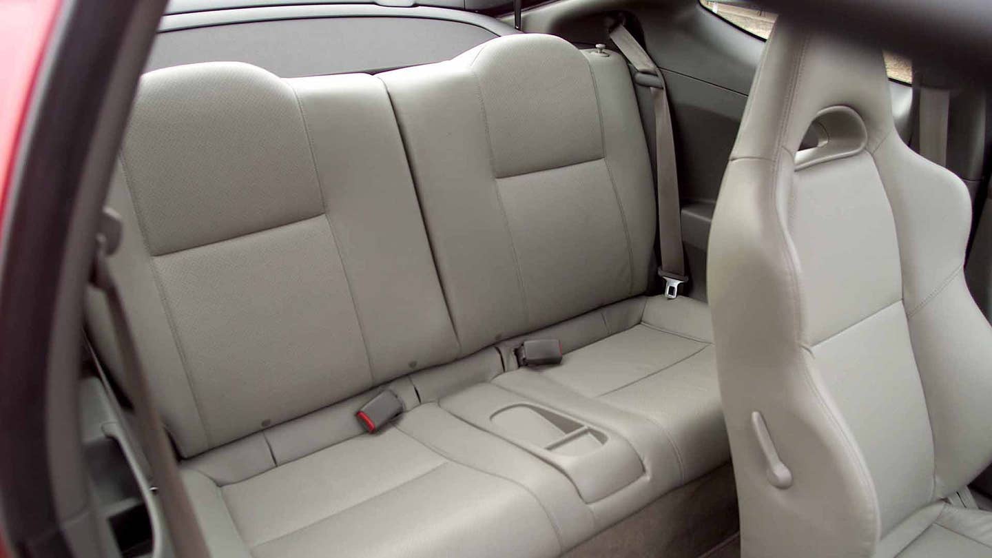 Tan rear seats in a 2002-2004 Acura RSX Type S.