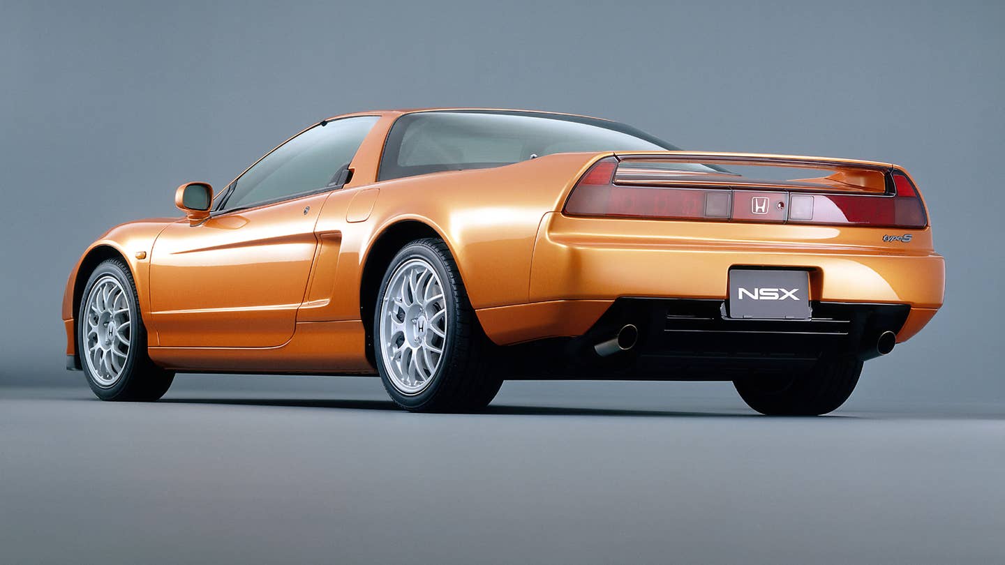The rear quarter studio view of the 1997 Acura NSX Type S. 