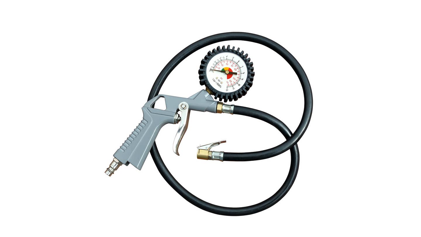 A tire inflator with a built-in pressure gauge.