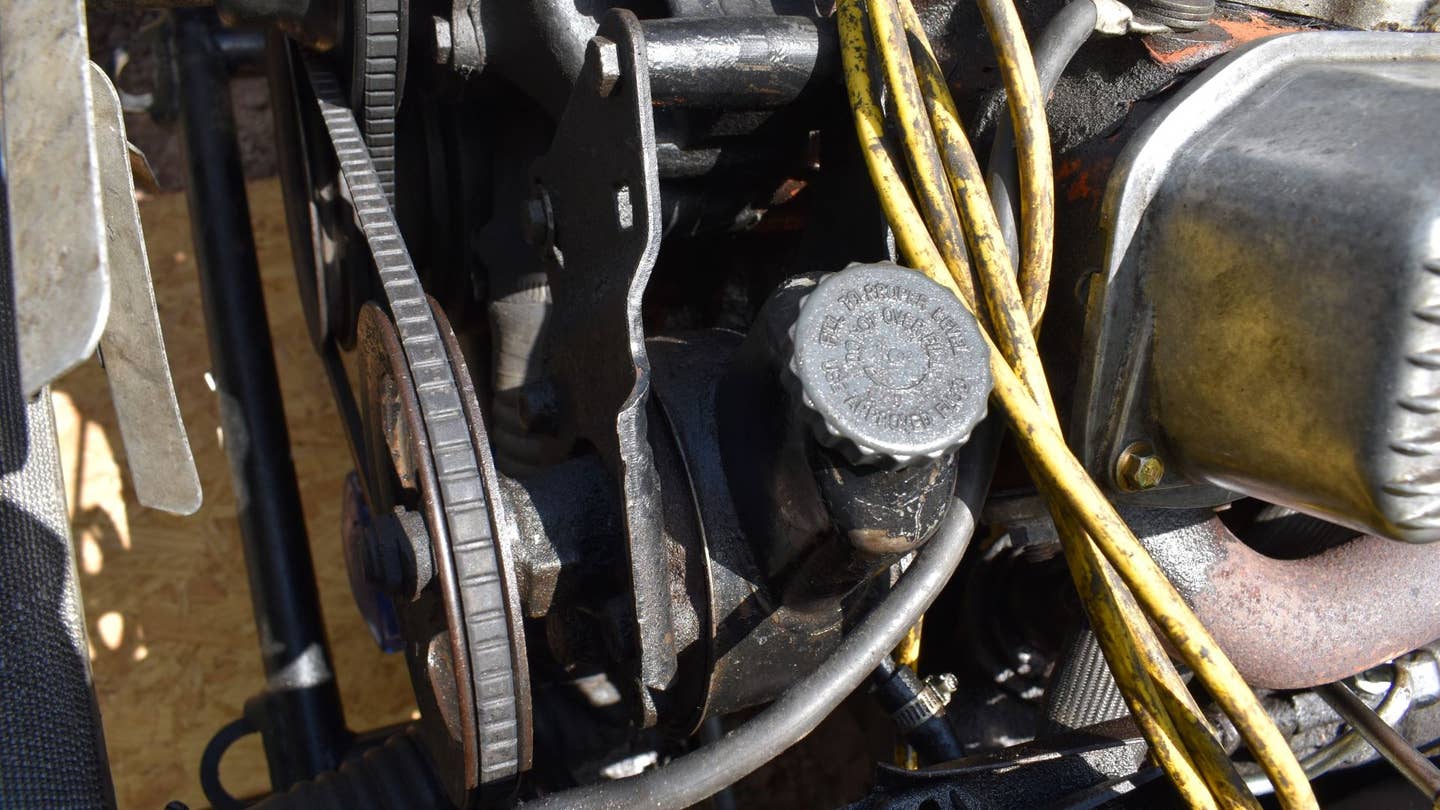 A power steering pump on a 1969 Dodge Charger.