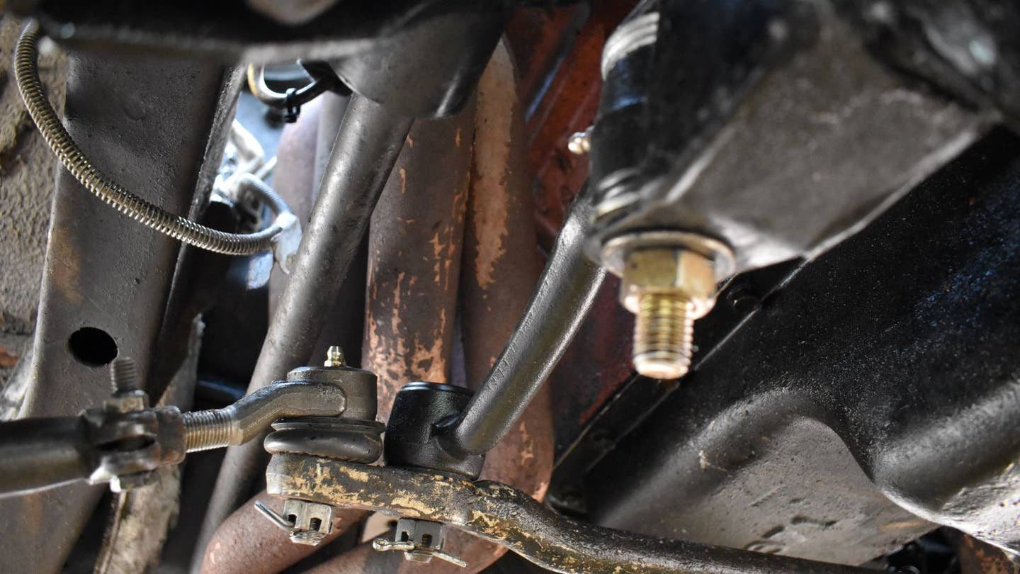 A close-up of the steering arms on a 1969 Dodge Charger.