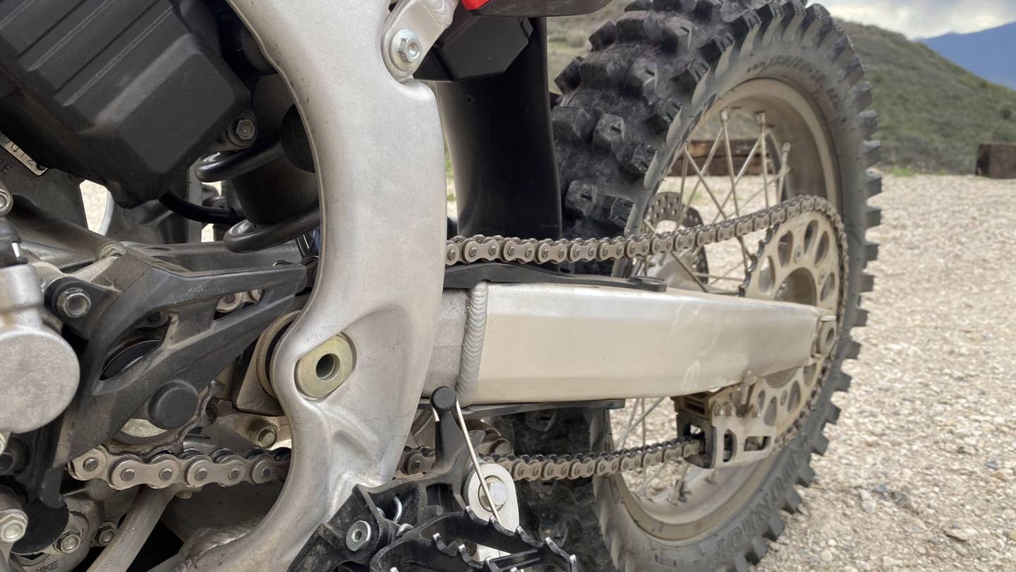 The countershaft sprocket connected to the rear sprocket via the chain. 