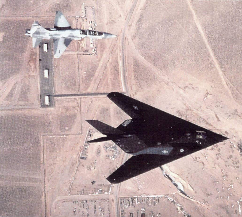 message-editor%2F1622726588957-4450th_tactical_group_f-117_and_t-38_over_tonopah_test_range_airport.jpg