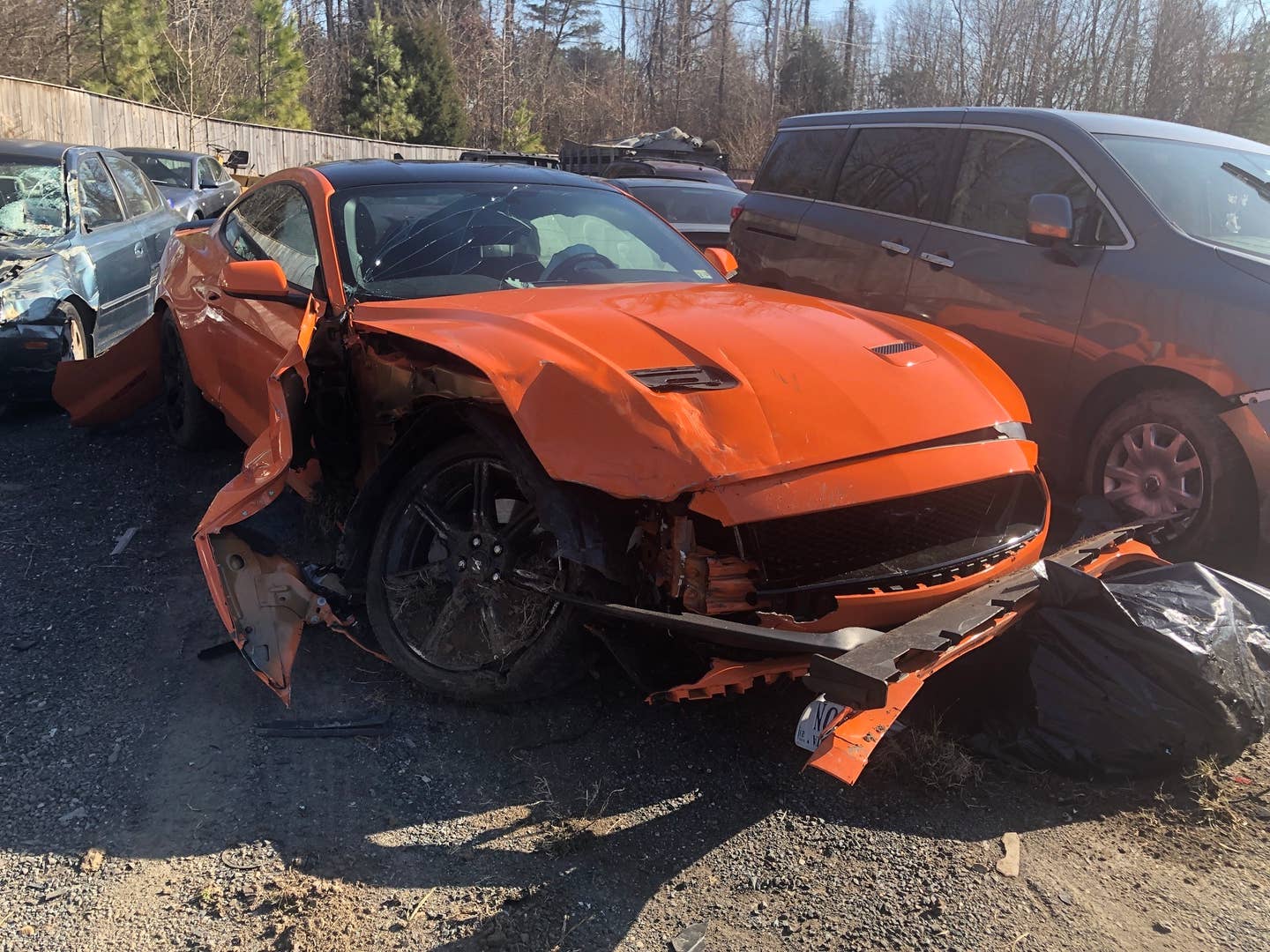 A new Mustang GT wrecked.
