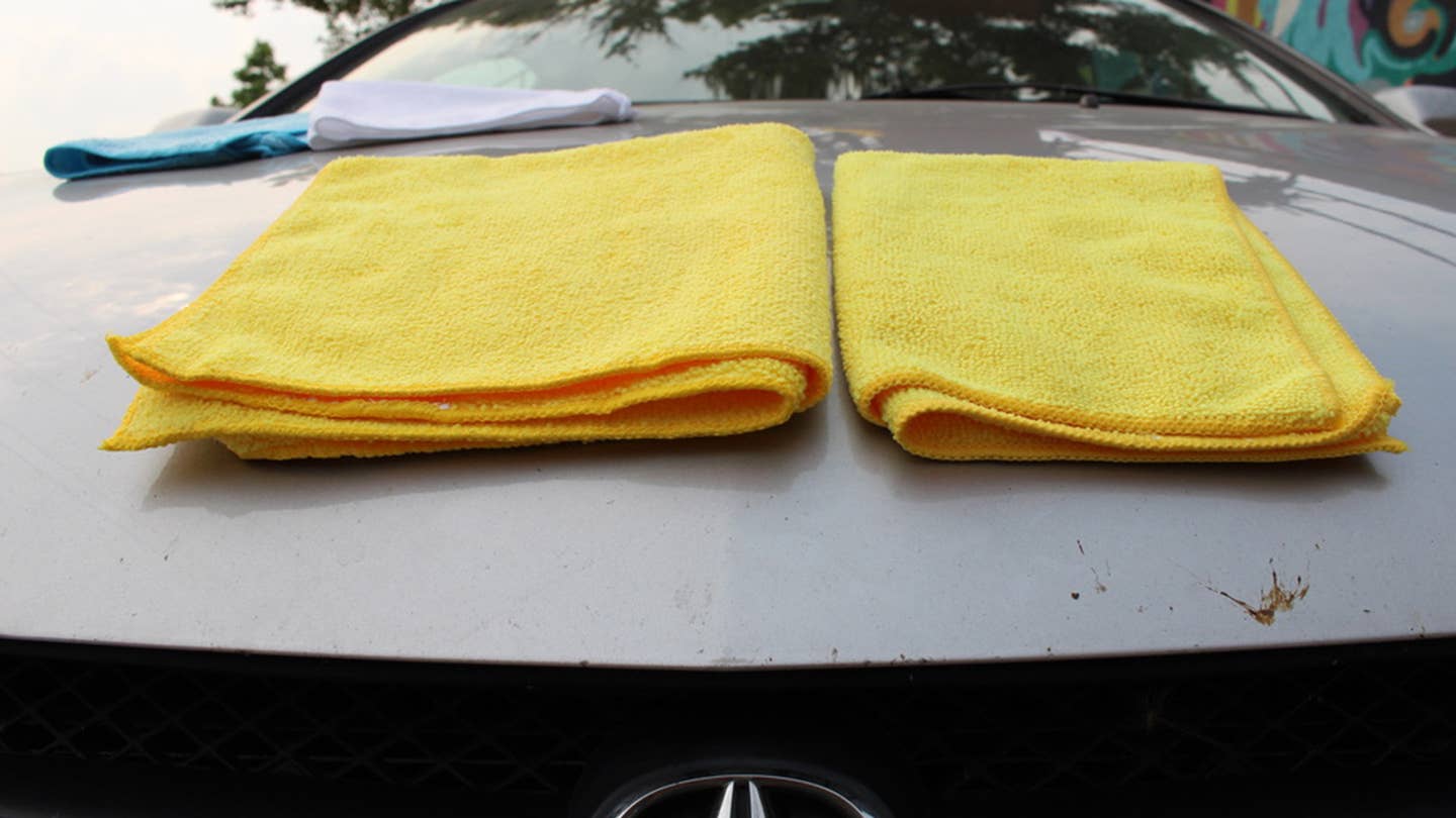 A comparison of Costco and Amazon's microfiber towels folded twice.