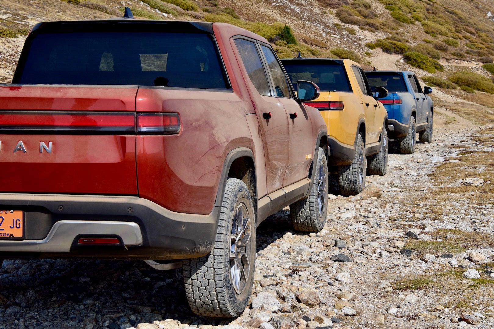 2022 Rivian R1T Launch Edition in red, yellow, and blue