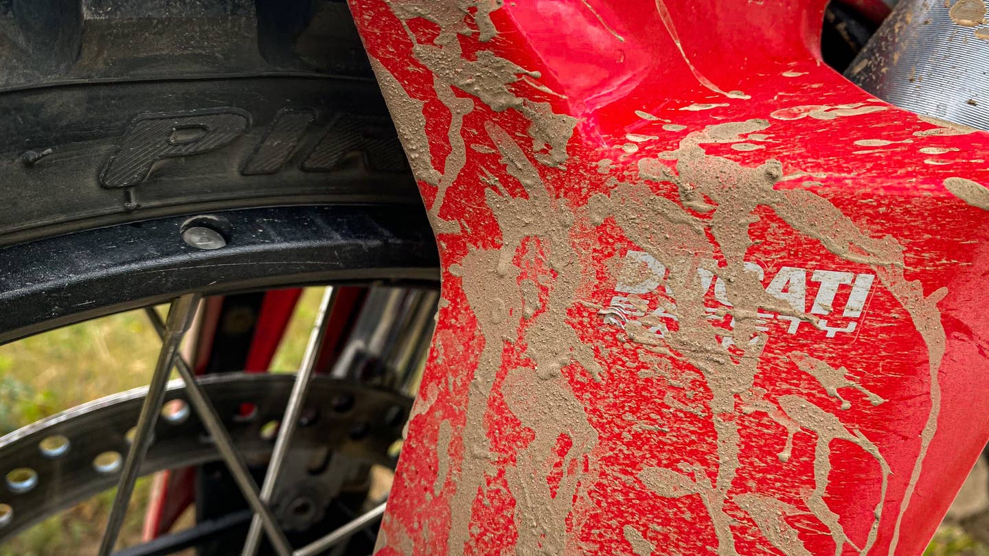 The muddy front fairing of the Ducati.