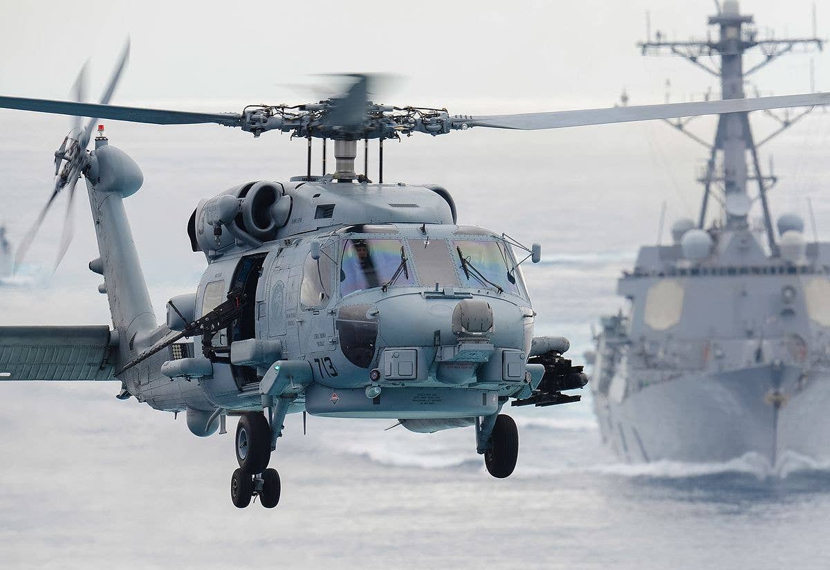 message-editor%2F1647381529071-1200px-mh-60r_sea_hawk_helicopter_prepares_to_land_aboard_the_aircraft_carrier_uss_john_c._stennis_cropped.jpg