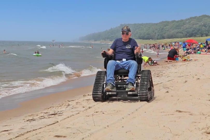 These All-Terrain Electric Wheelchairs on Tank Tracks Help People