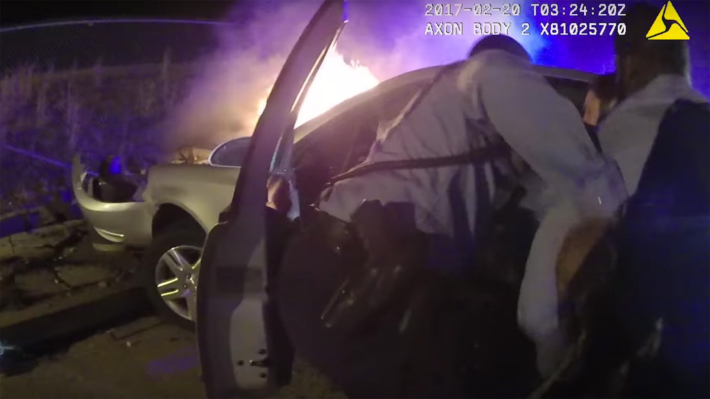 Watch These D.C. Police Officers Pull a Man From a Burning Car