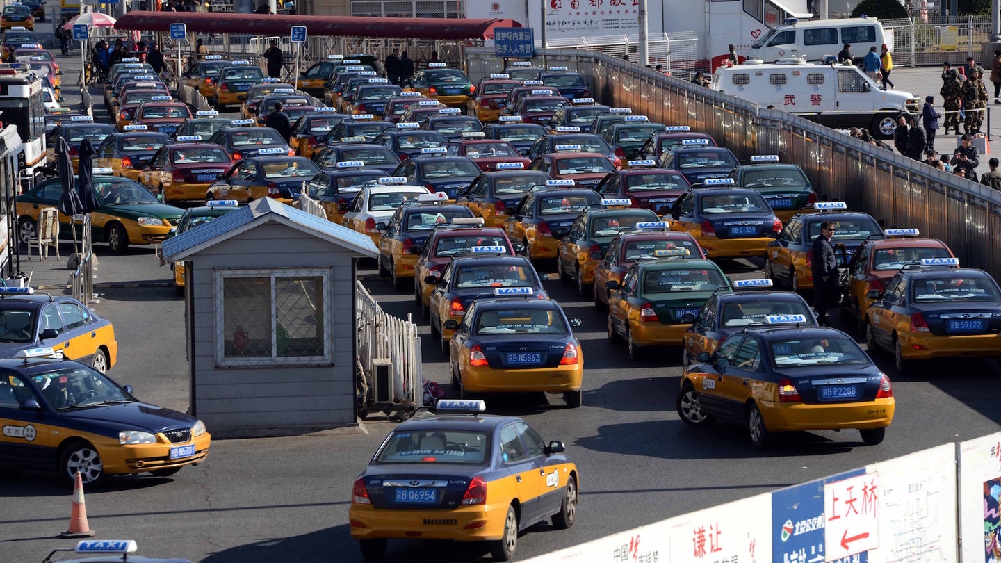 Beijing Is Swapping Nearly 70,000 Gas Taxis For Electric Cars