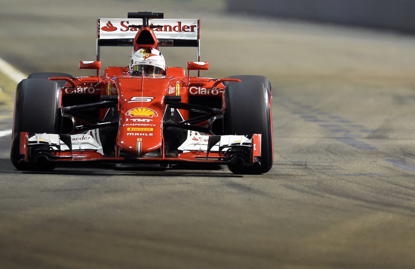 Watch Sebastien Vettel Crash His Ferrari F1 Car In the Wet While Testing Pirelli Tires
