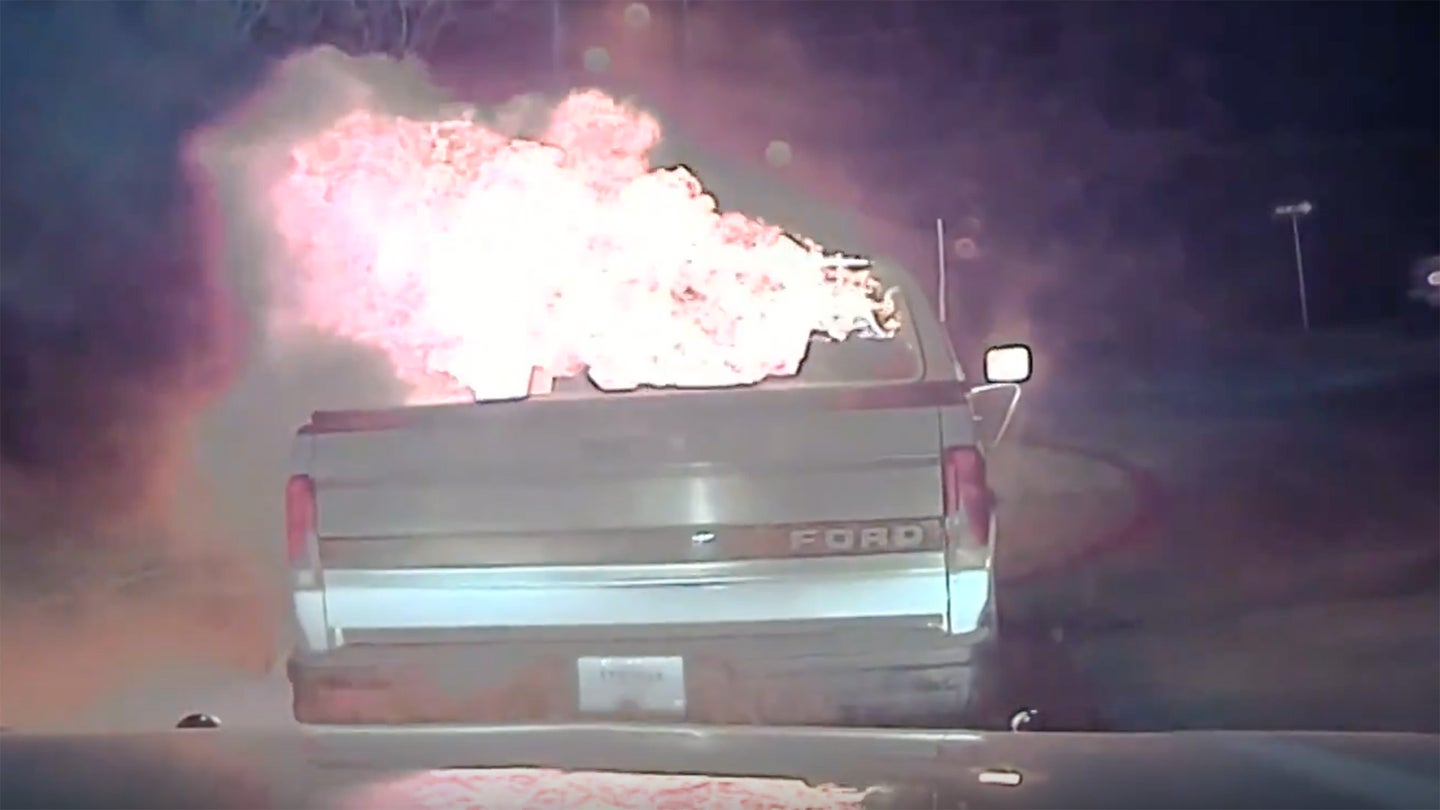 Police Officer Uses Chevy Tahoe to Push Burning Ford F-150 Away From Building