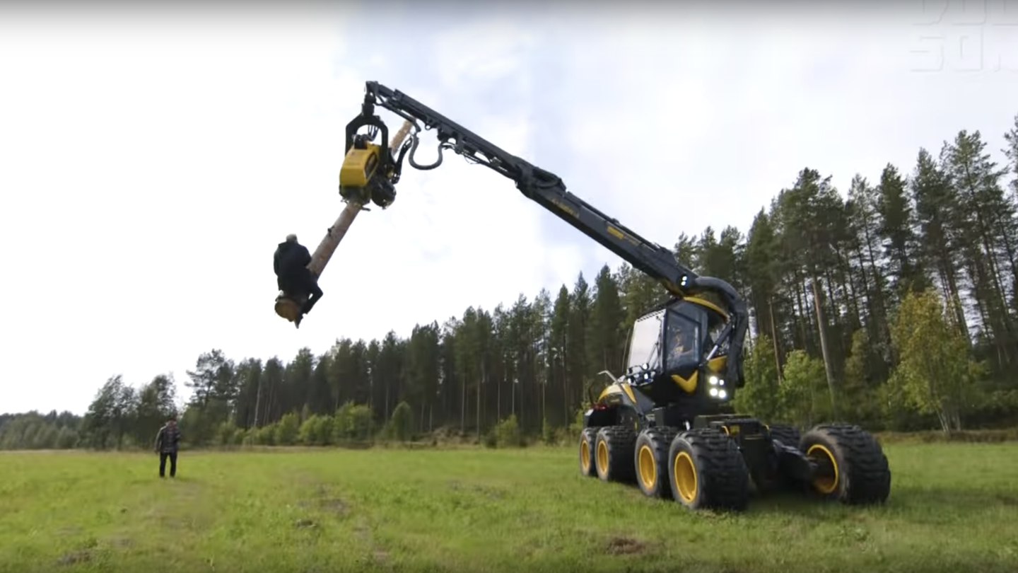 Watch Some Crazy Finns Ride a Logging Machine Like a Bull