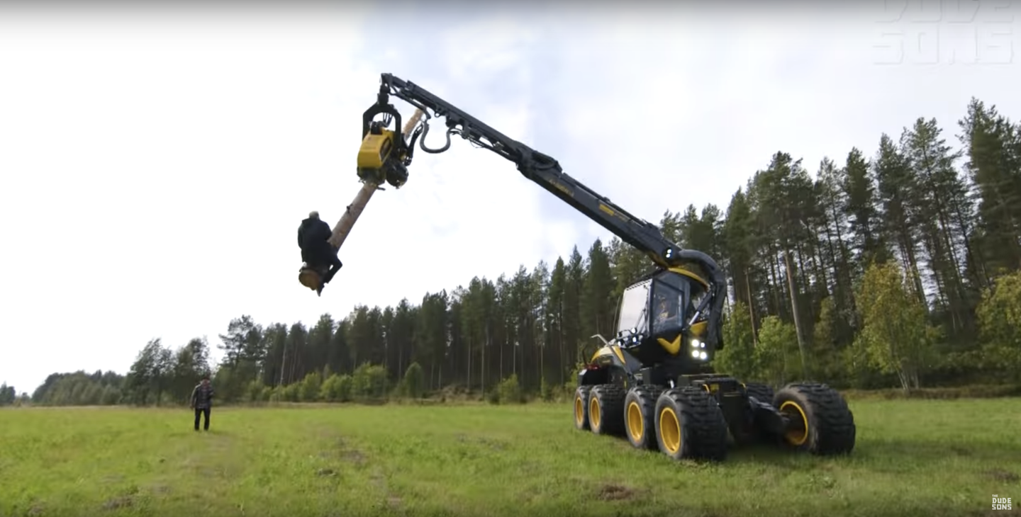 Watch Some Crazy Finns Ride a Logging Machine Like a Bull