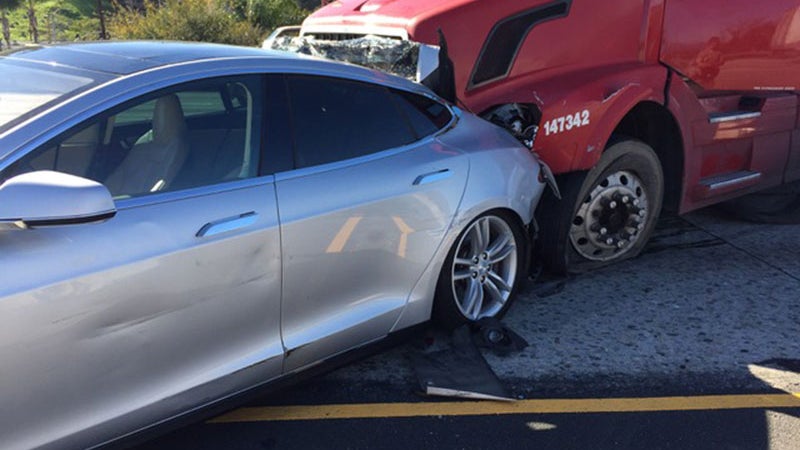 Tesla Model S Gets Rear-Ended by a Semi-Truck, Driver Walks Away