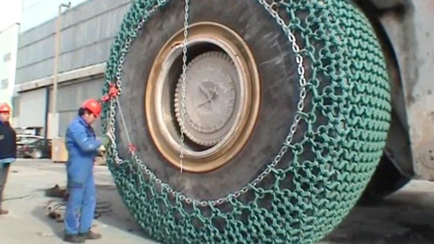 Putting Chains on a Massive Front-End Loader&#8217;s $60,000 Tires Isn&#8217;t Easy