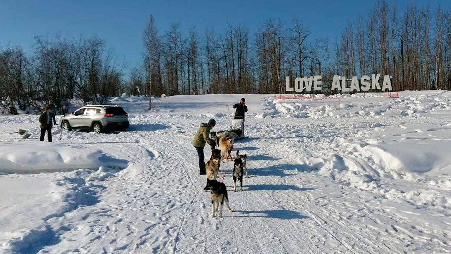 Sled Dogs Pulled a Jeep Cherokee Out Of the Snow in Alaska, Because Alaska