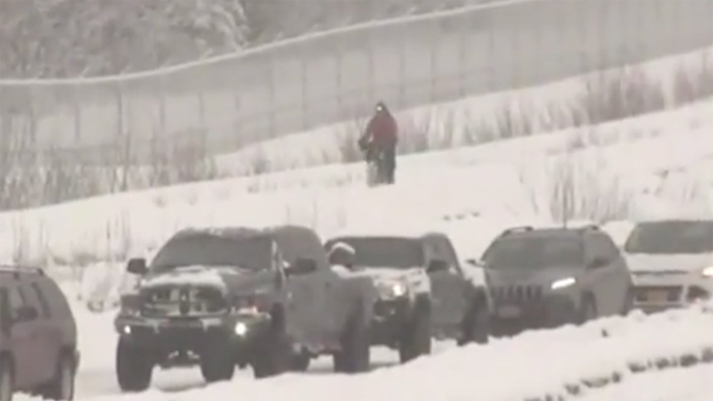 Determined Bicyclist Braves Alaskan Blizzard During Commute