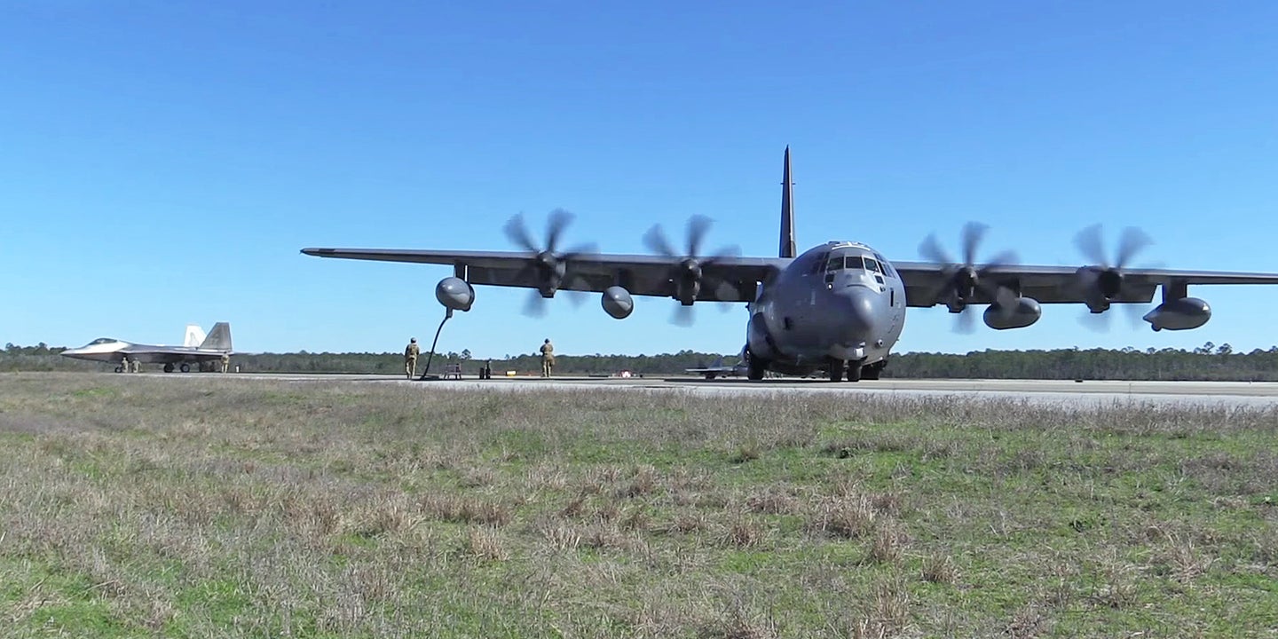 Spec Ops MC-130 Provides Forward Arming And Refueling Point For F-22 Raptors