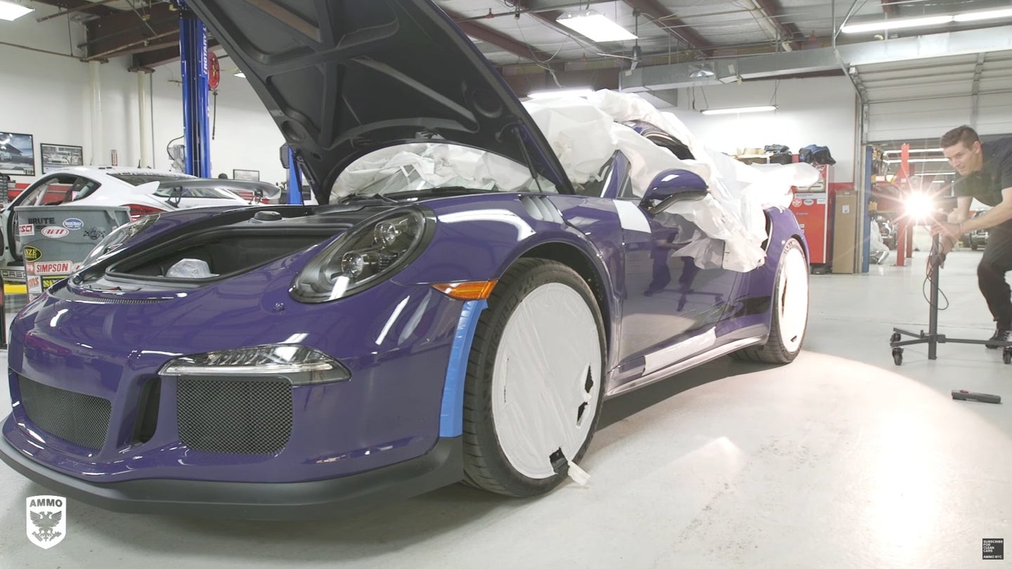 Inspecting The Paint Of A Freshly Delivered Porsche GT3 RS