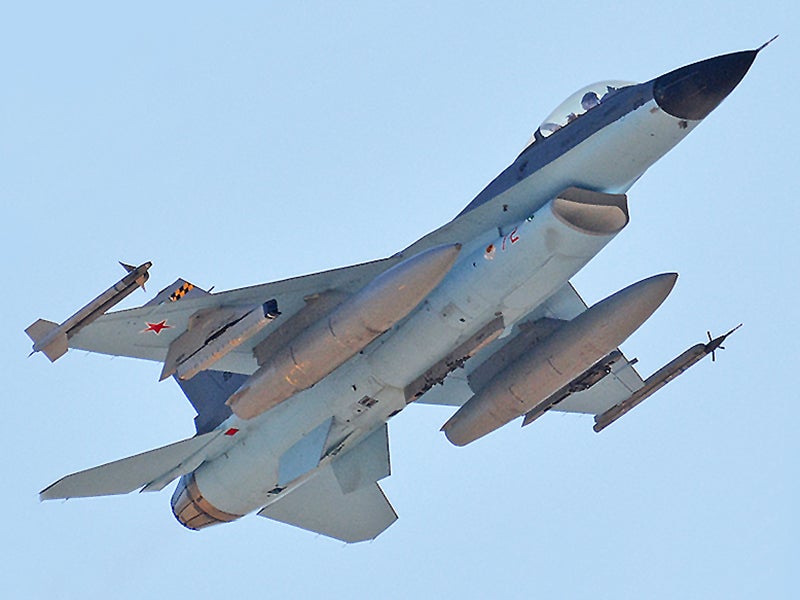 USAF Aggressor F-16 Freshly Painted In “Shark” Scheme To Mimic Latest Russian Jets