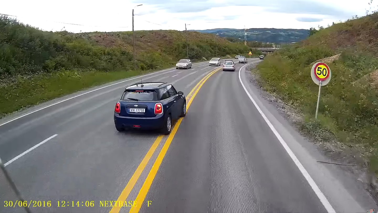 Watch a Mini Cooper Get a Dose of Instant Karma After Brake-Checking a Truck