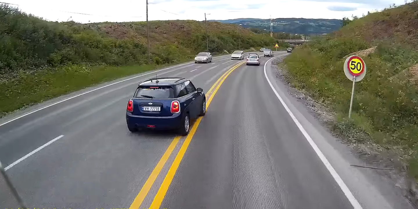 Watch a Mini Cooper Get a Dose of Instant Karma After Brake-Checking a Truck