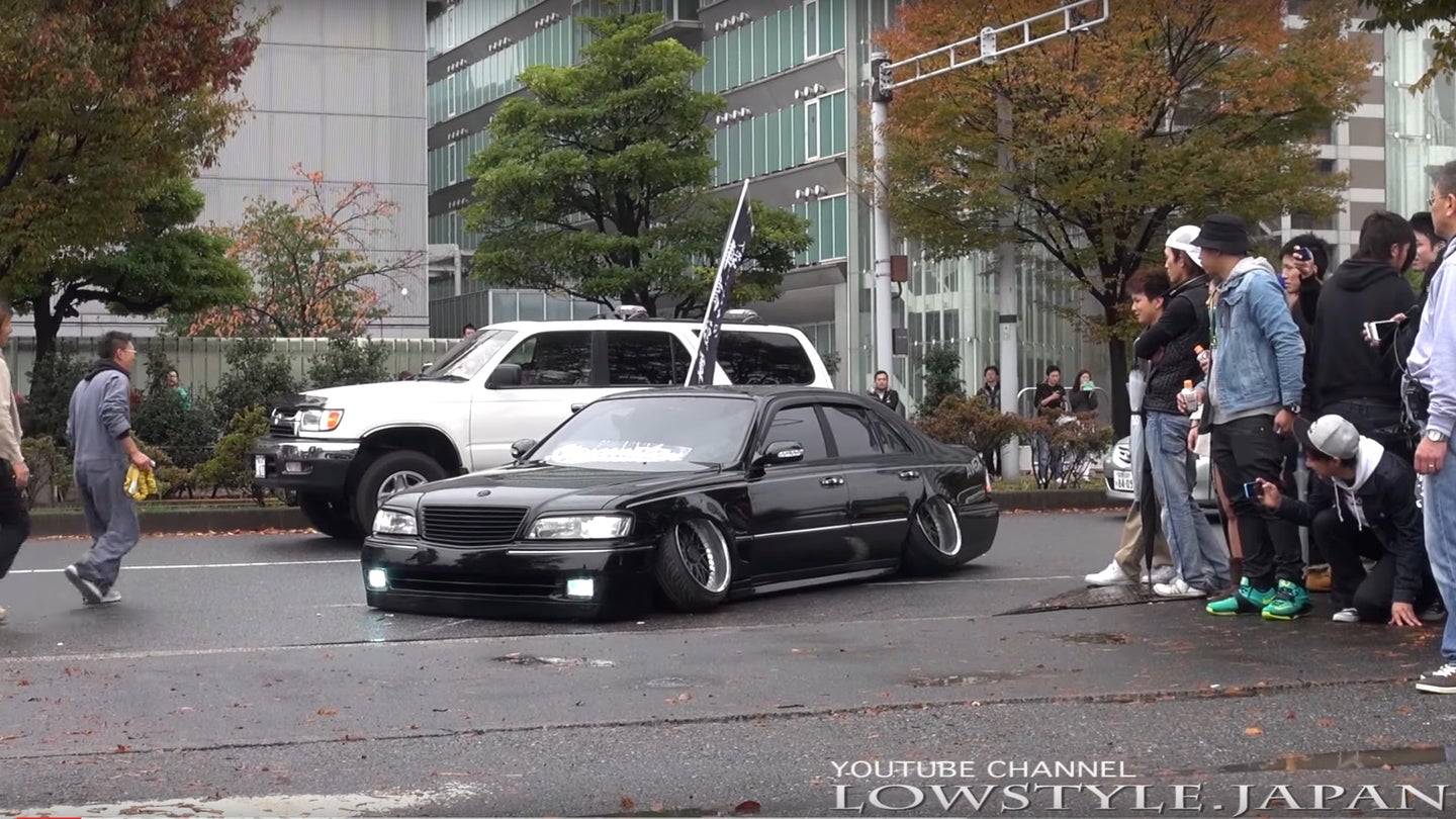 Watch This Stupidly Cambered Nissan President Struggle to Climb a Tiny Ramp