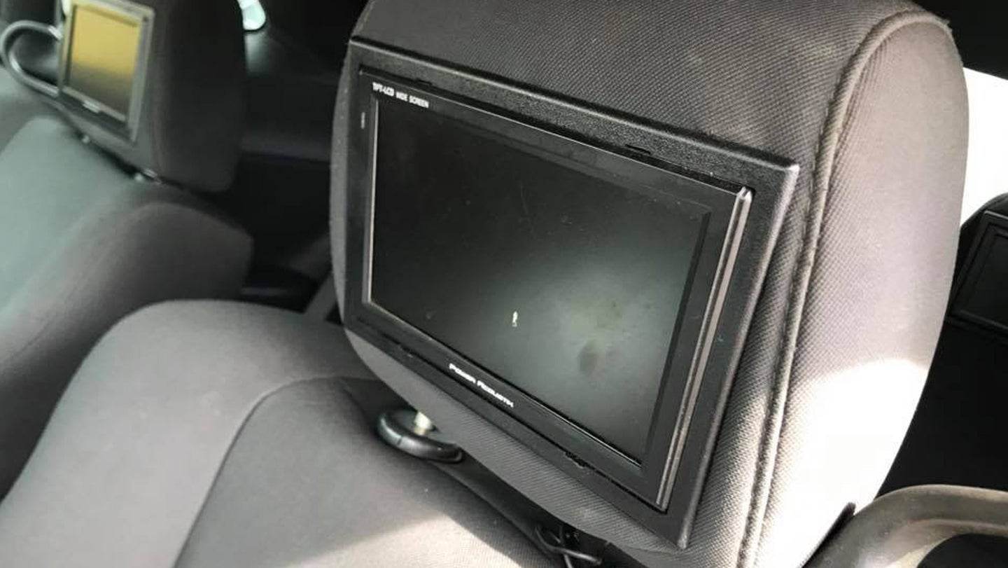 These Front-Facing Headrest Screens Are The Worst Car Mods Ever